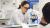 Brain Awareness Week person using microscope