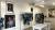 Manon Planche and Emily Eby's pop-up shop with racks of clothes and artwork and a table with glasses