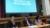 Three people at a table at the Westminster Policing Symposium