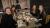 Four people around table at WBS alumni event