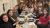 People sat around restaurant table for WBS alumni event