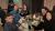 People sat around table at WBS alumni event