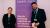 A man and a woman standing in front of a purple banner which reads ZONE29 UNIVERSITY OF WESTMINSTER STEP IN WORKING TOGETHER WITH OUR ALUMNI COMMUNITY