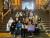 Group of Westminster students sitting on a grand staircase.