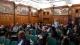 Picture of a participant asking questions from the panel and being part of the discussion. 