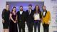 Linsey Cole, an alumni representative, a student representative and Professor Dibyesh Anand stand with representatives from the KCW Business Awards team in front of a screen that reads HIGHLY COMMENDED. Professor Anand holds Westminster's certificate.