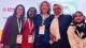 Ayanna Deane and other alumni with Regina Keith at WPHN Congress
