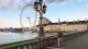 Brisk walker in mask on Westminster bridge during lockdown