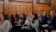 Picture of student participants interacting with each other at the DEN conference.