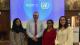 Picture of student Anisa Rashid (far left) and student Victoria Ramirez (far right) met with IOM’s Director of Human Resources, Mr Michael Emery, during his visit to the University in March 2022.
