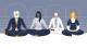 Four people meditating