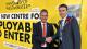 Professor Peter Bonfield and the Lord Mayor of Westminster shake hands in front of the Zone29 site hoarding.