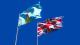 Saint Lucia and UK flags in the wind