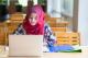 A student working on their laptop