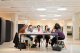 Students sat at a desk in the learning platform.