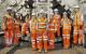 Image of women wearing hi-visibility jackets on a construction site