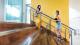 two students walking on stairs