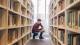 student browsing books in cavendish library