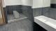 Photo of ablution facilities outside the new Cavendish campus prayer rooms. This features a sink and an area to wash feet.
