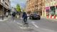 Picture of cyclists riding in the cycle lane on a London road.