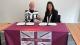 Picture of Professor Alex Hughes shaking hands with Dr Indu Shahani