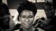 Black and white headshot of alumna Ayanna Deane.