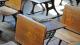 Chair and desk in old classroom