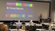 Dr Doug Specht delivering a presentation at the IUT Conference