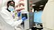 Dr Mustapha Bittaye wearing mask in lab