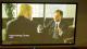 A photo of a projector screen displaying Matt Frei interviewing Donald Trump