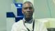 Professor Godfrey Kyazze in the lab wearing a white lab coat.