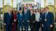 Group photo of some attendees at the UK-Uzbekistan Education Forum in the historic staircase of Westminster's Regent Street Building. 