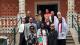 A group photo of Westminster colleagues and alumni standing in front of the British Pavillion.
