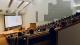 Students watching a presentation in a lecture hall