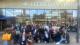 Picture of Westminster students posing for a group photo outside Leeds Central Station.