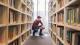 A student looking at library books