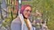 Alunma Nuha Eltinay in front of foliage background
