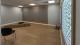 Photo of the new Muslim prayer room on Westminster's Cavendish campus. There are mats on the floor and a light up mural on the wall.