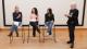 WCN psychology panellists sitting on stools with Chantal Gautier to their right standing
