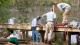 Workers building a wooden bridge