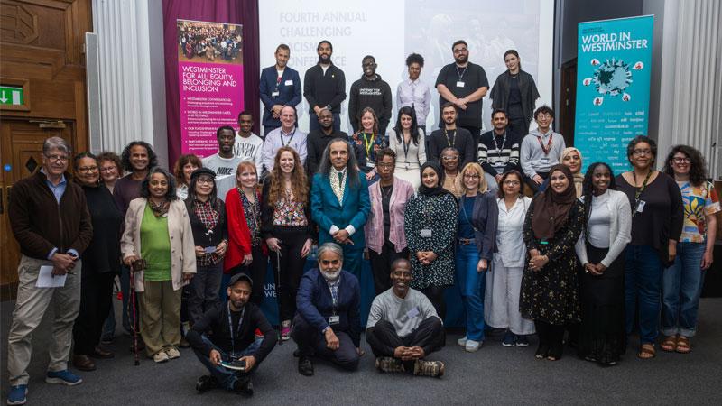 Group photo of attendees at the conference.