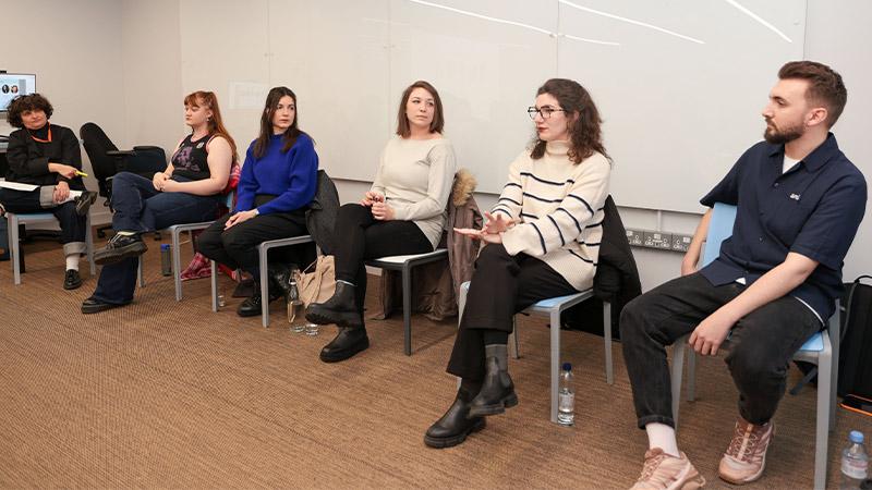 Alumni panel sitting and talking at the What Comes Next Photography and Film event