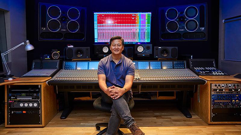 Audio Production Alumnus Kim Tae Hak in a sound studio.