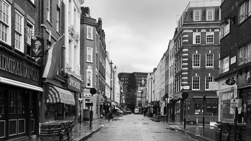 Black and white photo of the streets of Soho