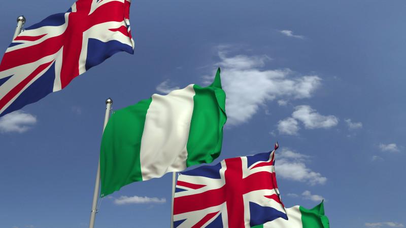Britain Nigeria flags. Credit: Novikov Aleksey/Shutterstock.com