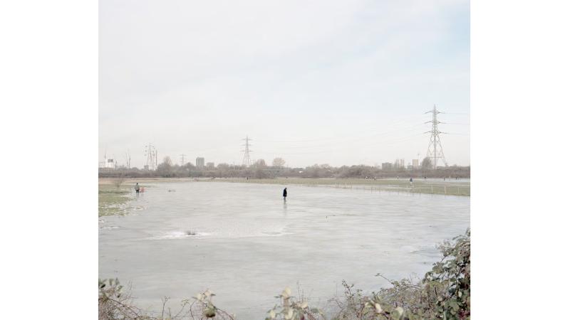 Man standing in the middle of a flood