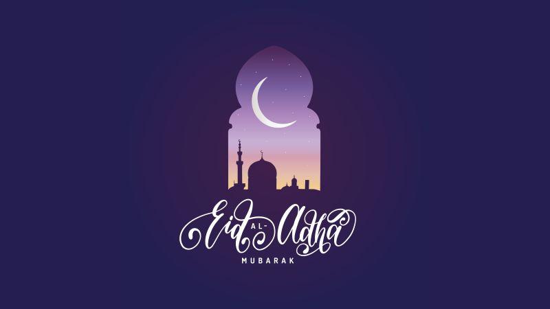 Wording Eid-Al-Adha with a moon in the background