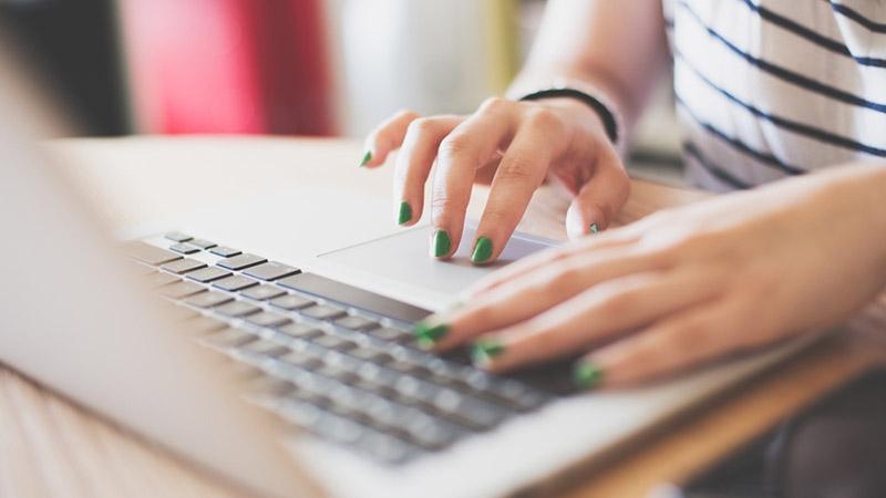 Girl-using-laptop Thumbnail
