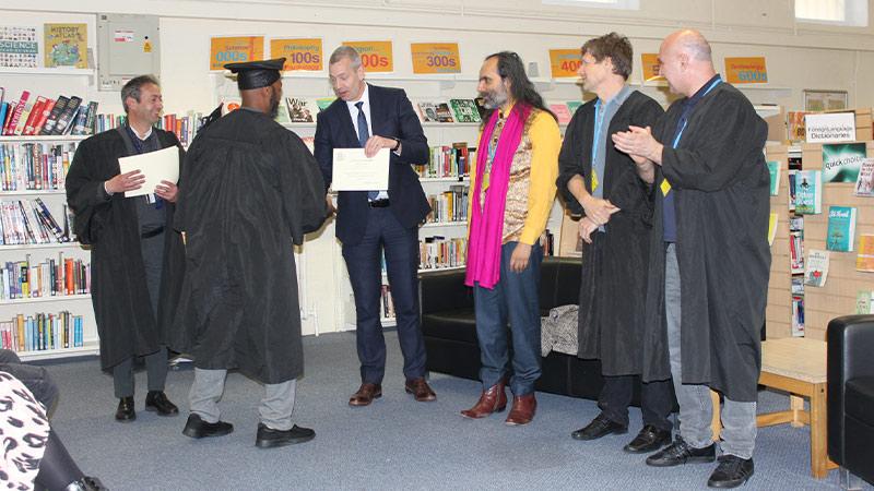 Graduation ceremony HM Pentonville, handing out diplomas