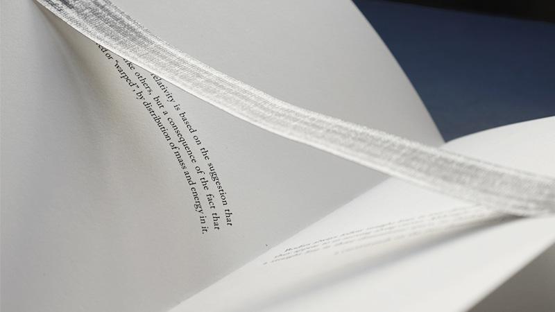 Photo of interior of book with text on page 
